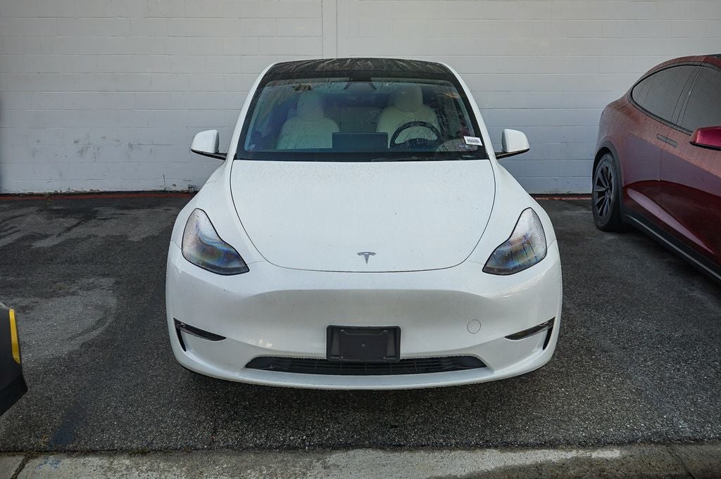 Used 2025 Tesla Model Y Performance with VIN 7SAYGDEF6SF310180 for sale in Huntington Beach, CA